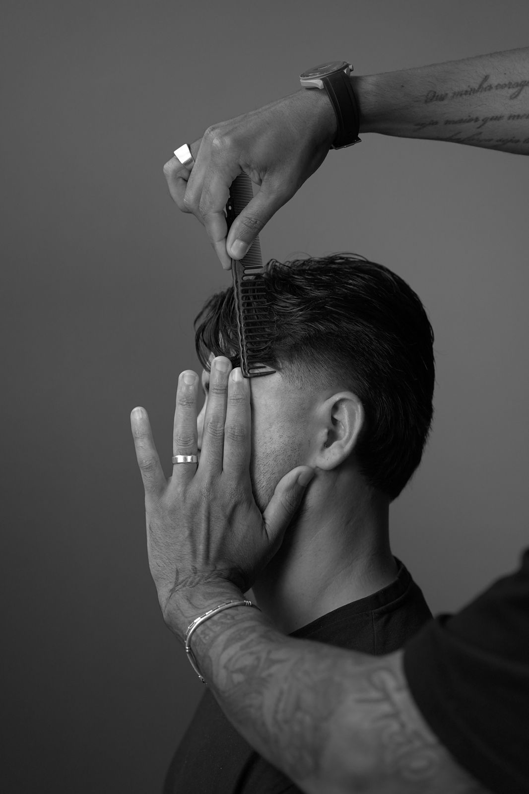 Barber training session with comb work